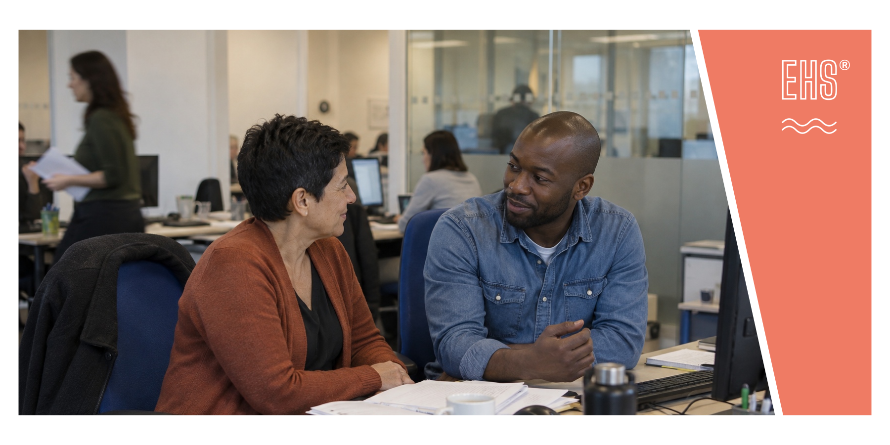 Colleagues talking during a normal working day with EHS branding
