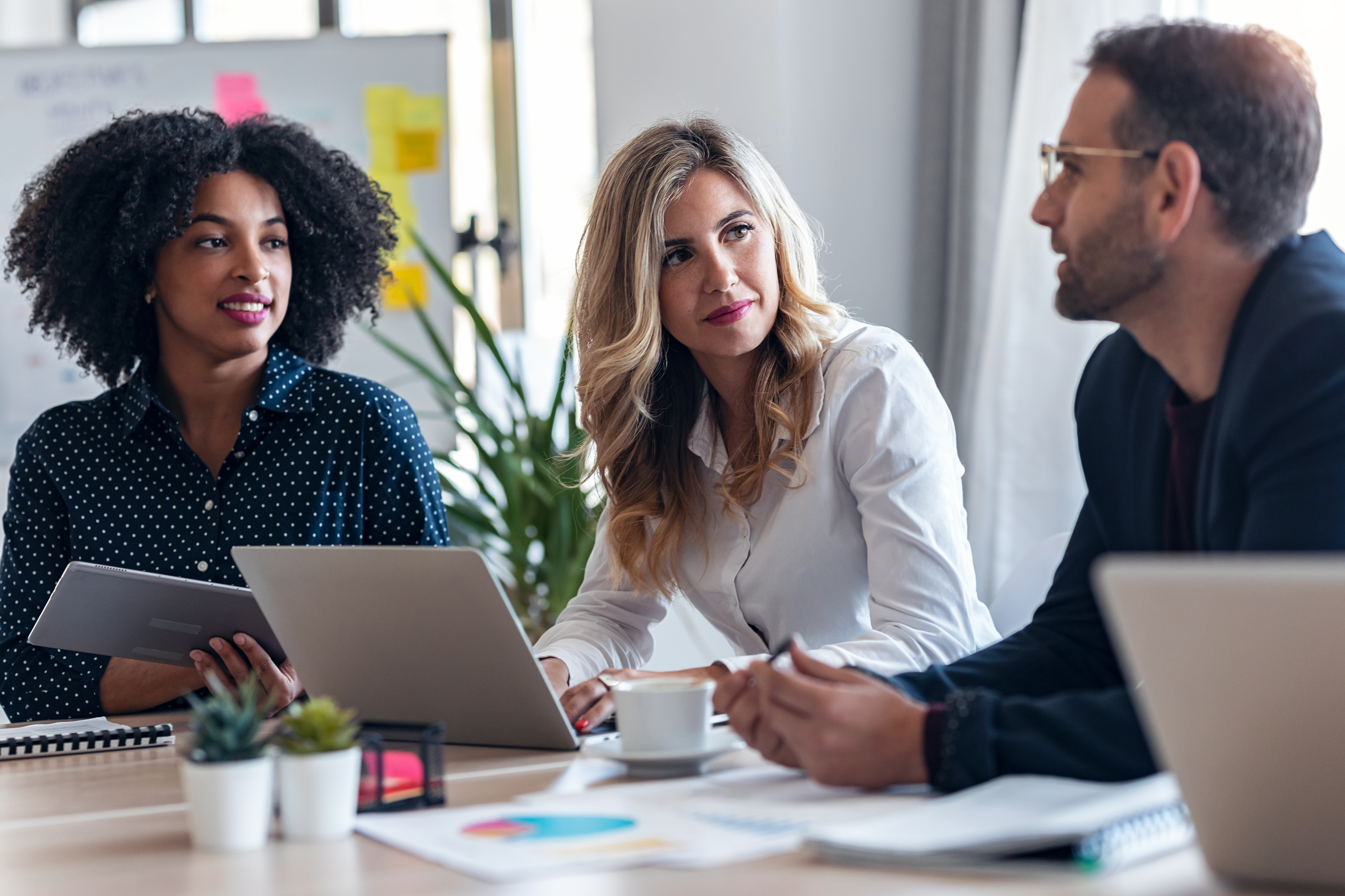 casual-business-people-working-with-laptops-while-2026-01-05-00-57-45-utc